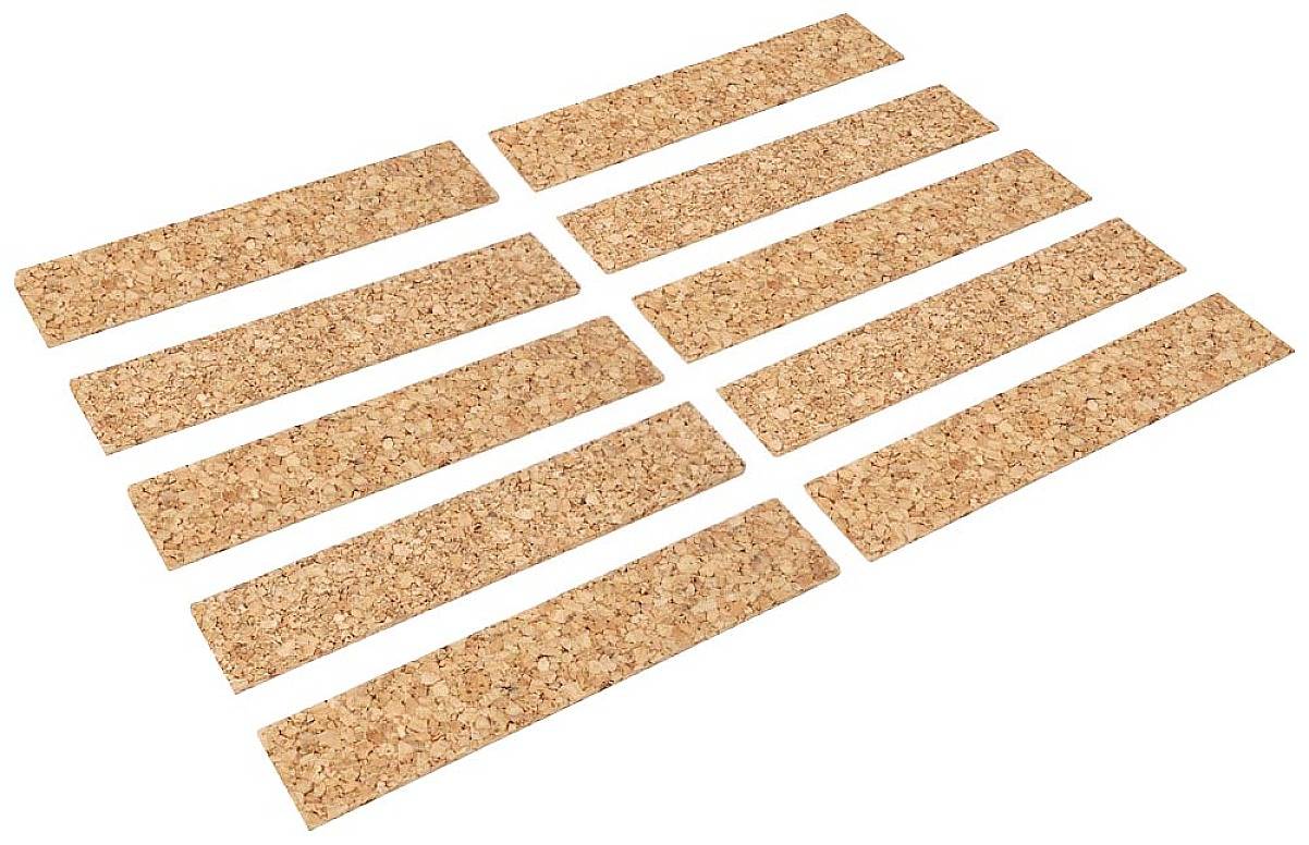 Dix bandes de liège oblongues, alignées uniformément côte à côte, montrent un agencement de matériaux de construction ou de produits isolants.