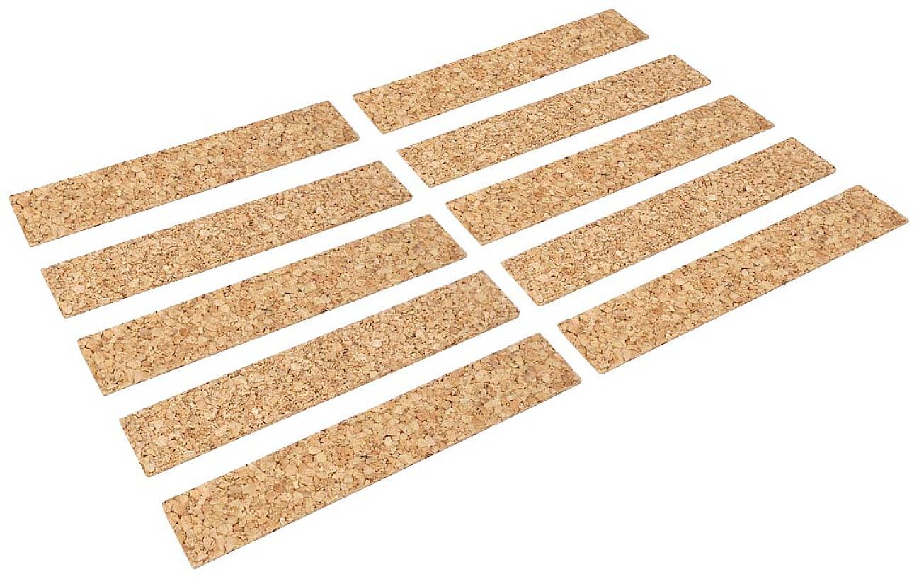 Dix plaques de liège rectangulaires, disposées de manière uniforme, sur un fond blanc.