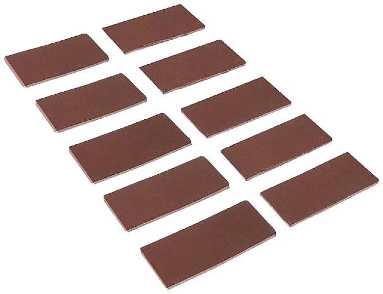 Dix coussinets en feutre marron, rectangulaires, disposés uniformément en deux rangées, probablement utilisés comme patins de meuble ou pour protéger des surfaces.