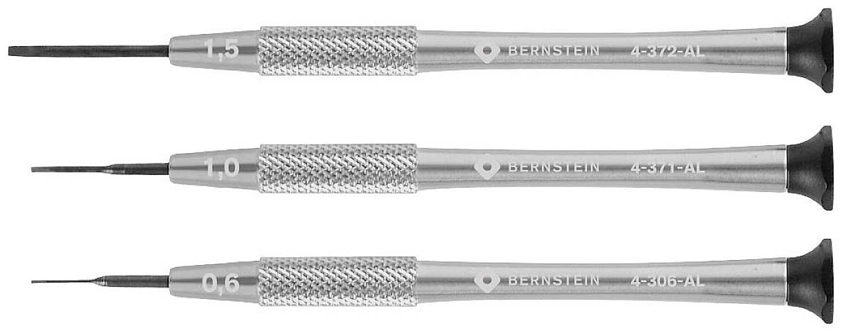 Trois tournevis de précision à poignée antidérapante et marquage de taille : 1,5 mm, 1,0 mm et 0,6 mm.