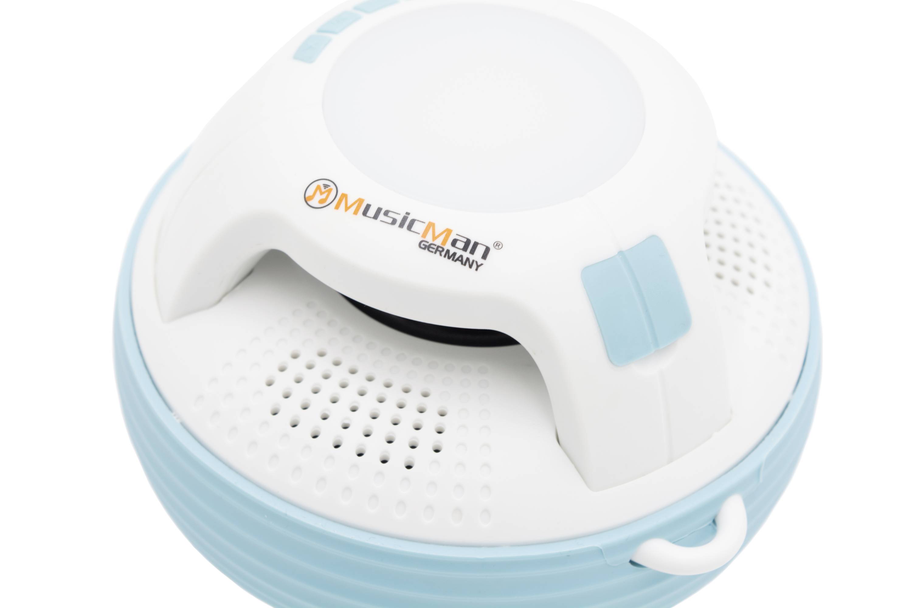 Enceinte portable ronde en blanc et bleu avec le logo de marque 'MusicMan Germany' sur le dessus.