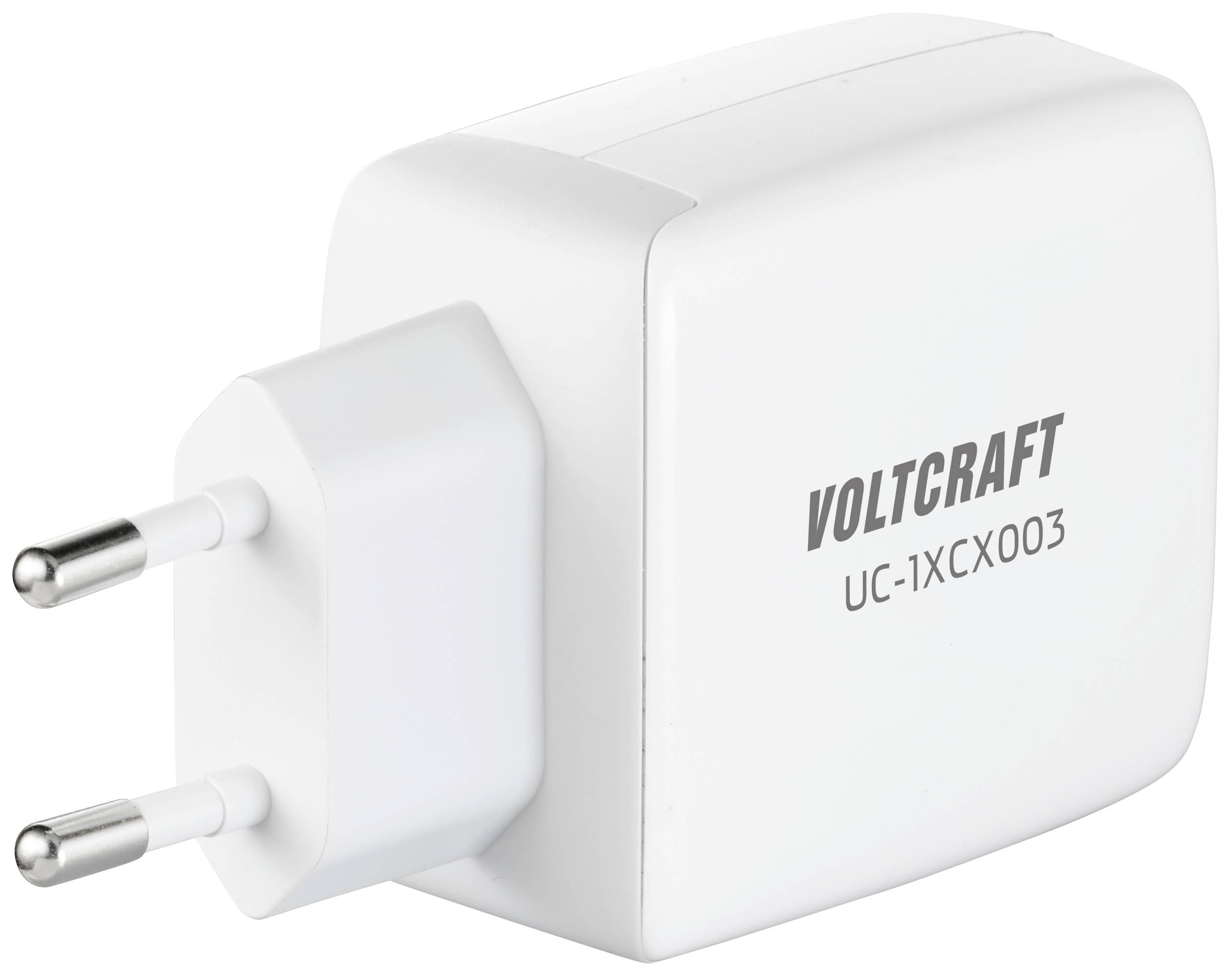 Chargeur blanc avec fiche européenne ; marqué 'Voltcraft' et numéro de modèle 'UC-1XCX003'.