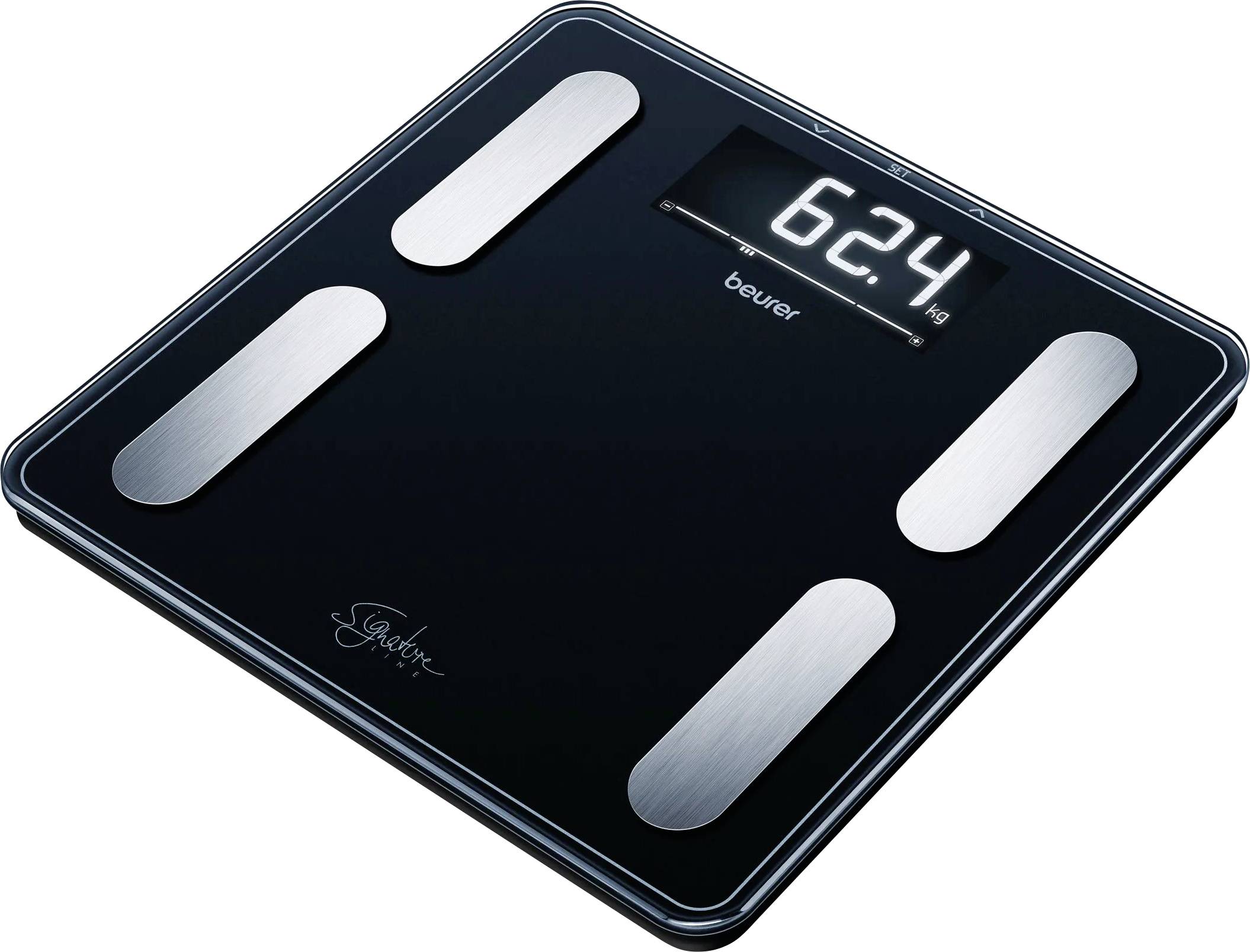 Balance numérique noire avec plateaux de capteurs argentés affichant un poids de 62,4 kg. Marque 'Beurer' visible sur l'écran.