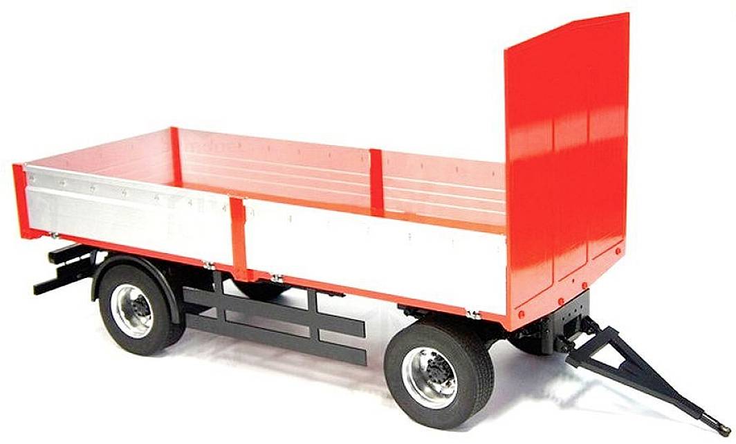 Remorque de camion en rouge et argent avec des roues noires.