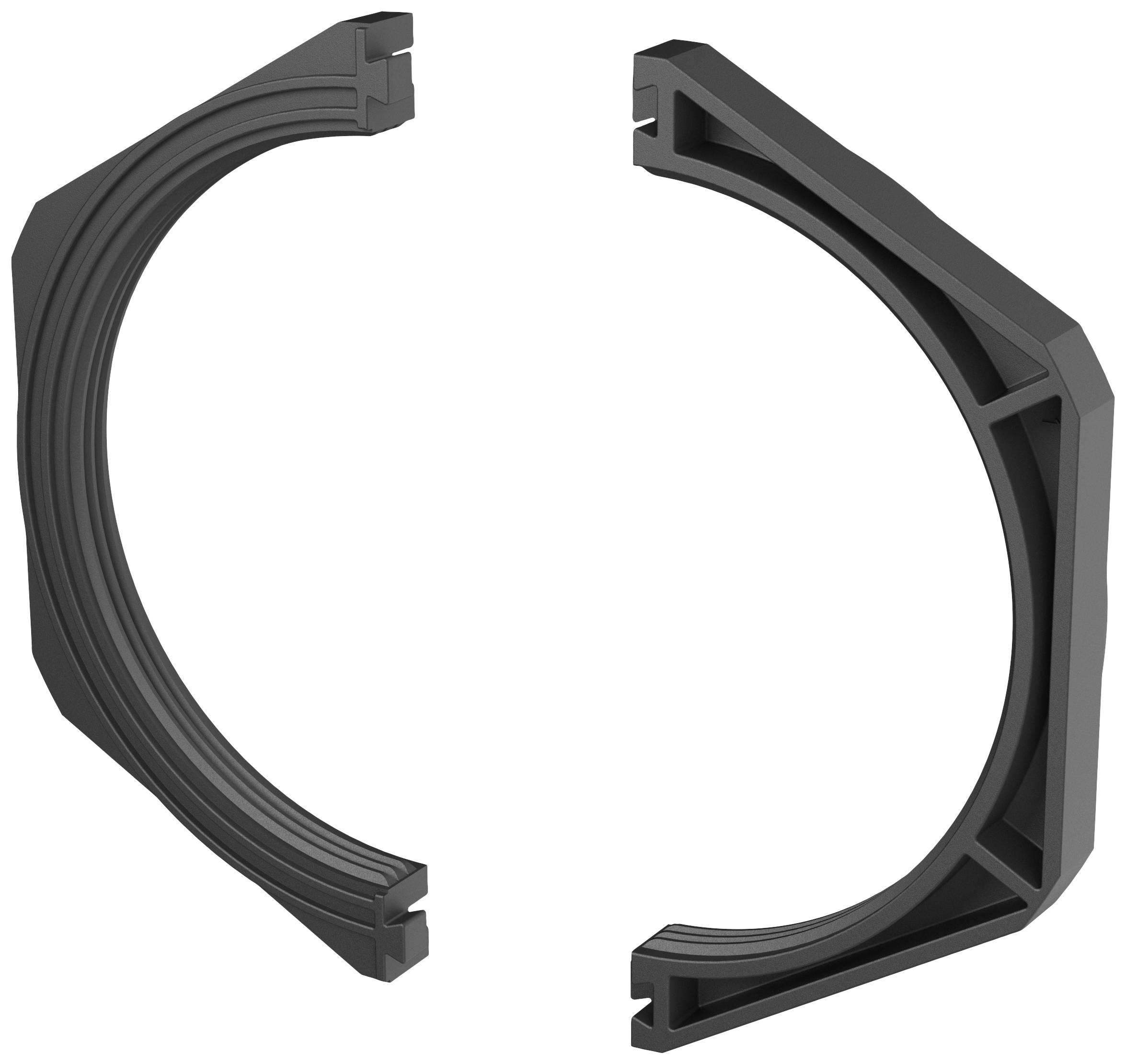 Deux demi-cercles en plastique noir, positionnés en face l'un de l'autre, probablement des parties d'un mécanisme de fermeture ou d'un support.
