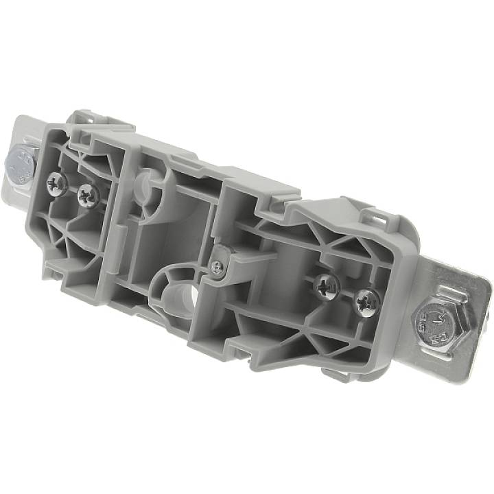 Un adaptateur en plastique gris avec plusieurs vis pour le montage. Il sert à fixer des composants sur une surface.