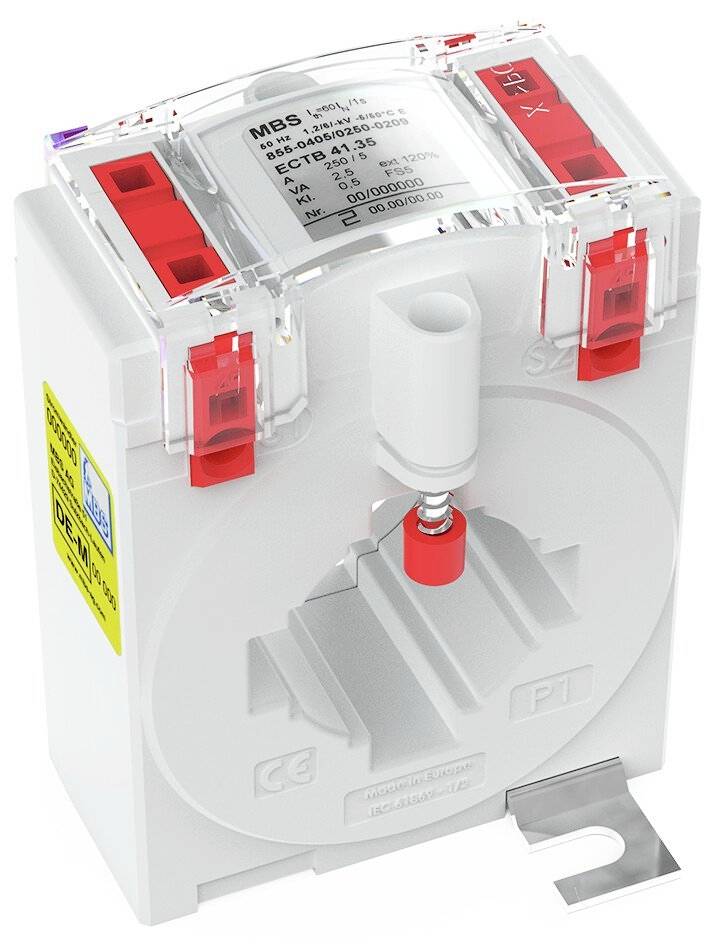 Un convertisseur électrique blanc avec des bornes rouges et une étiquette d'avertissement jaune sur le côté.