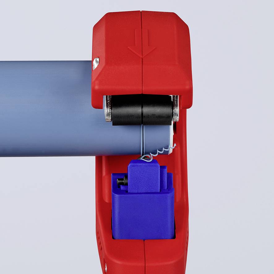 Tête de levier rouge avec une flèche pointant vers le bas, un cylindre bleu en dessous, servant de mécanisme de contrôle ou de commande d'un dispositif.