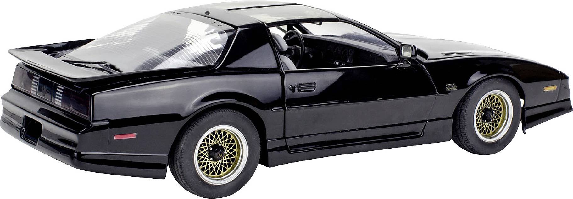 Voiture de sport noire à la forme distinctive, photographiée en plongée oblique de trois-quarts arrière, avec des jantes dorées.