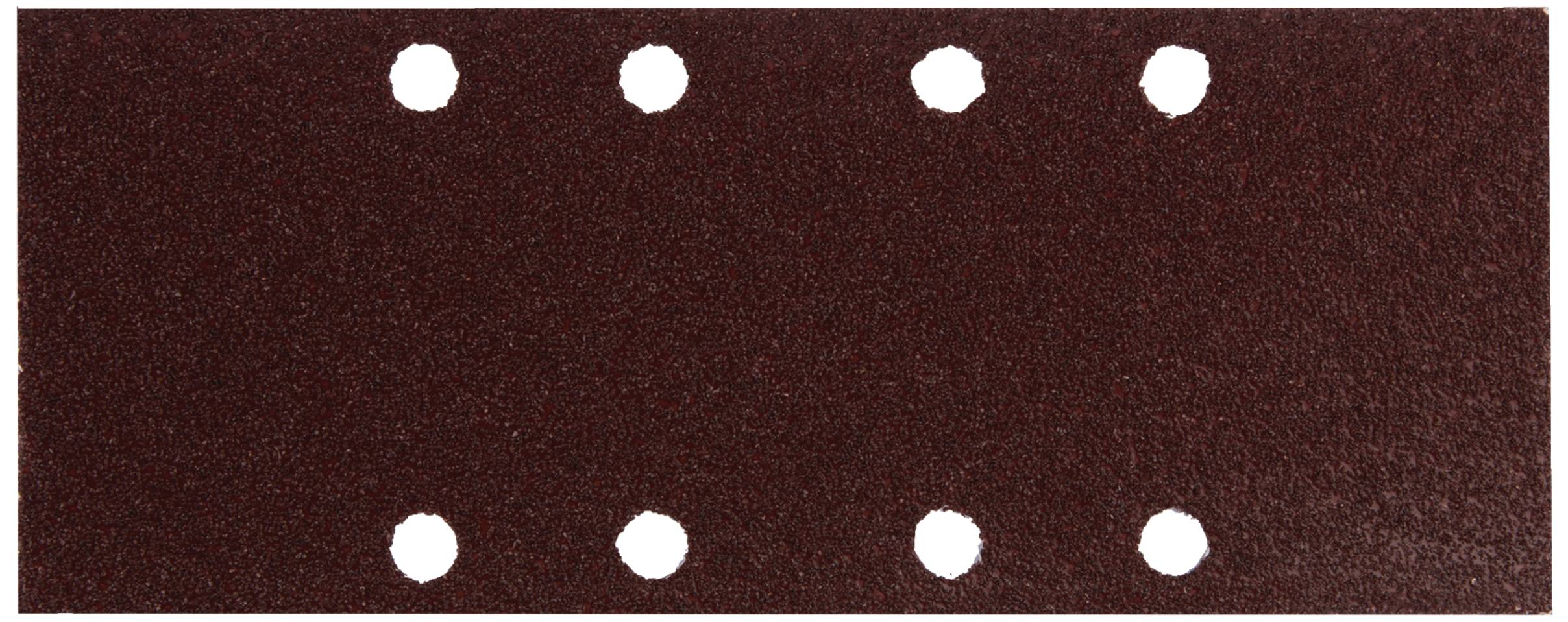 Papier de verre rouge avec six trous régulièrement disposés.