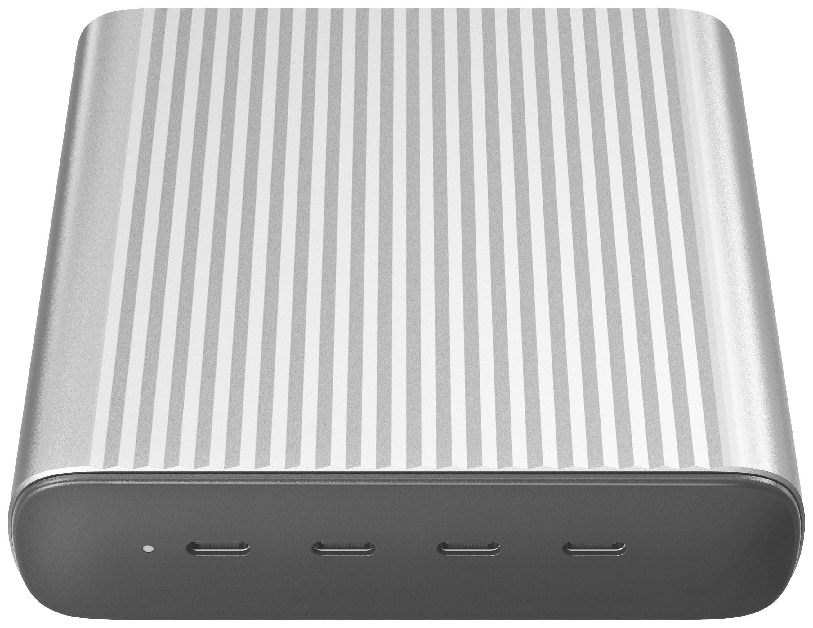 Disque dur externe avec boîtier métallique et surface striée, muni de trois ports USB-C sur la façade avant.