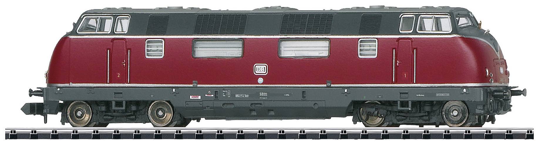 Vue latérale d'une locomotive de train miniature rouge foncé avec un toit noir, finement détaillée, posée sur des rails, sans environnement.