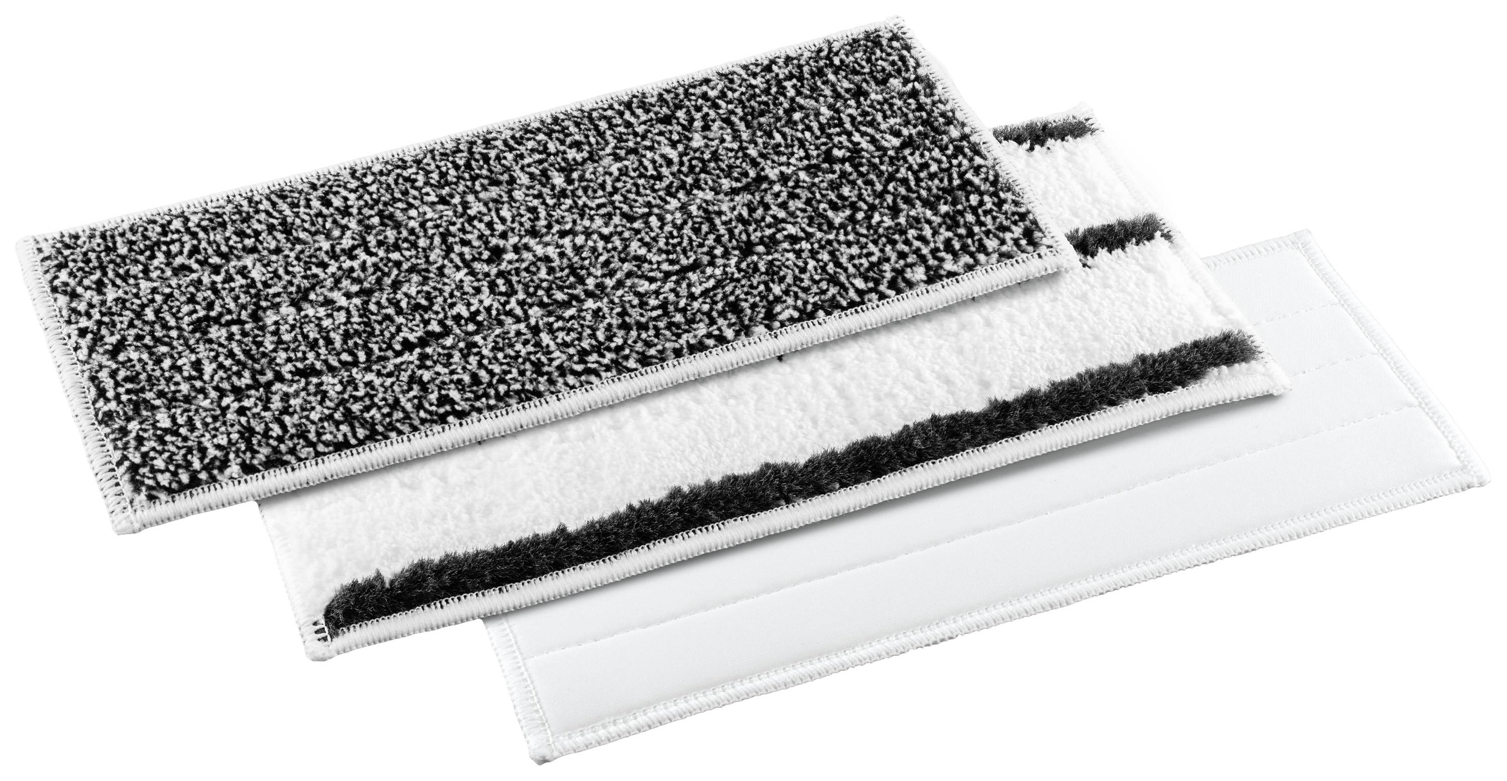 Trois tampons rectangulaires empilés les uns sur les autres, présentant différentes textures et couleurs.