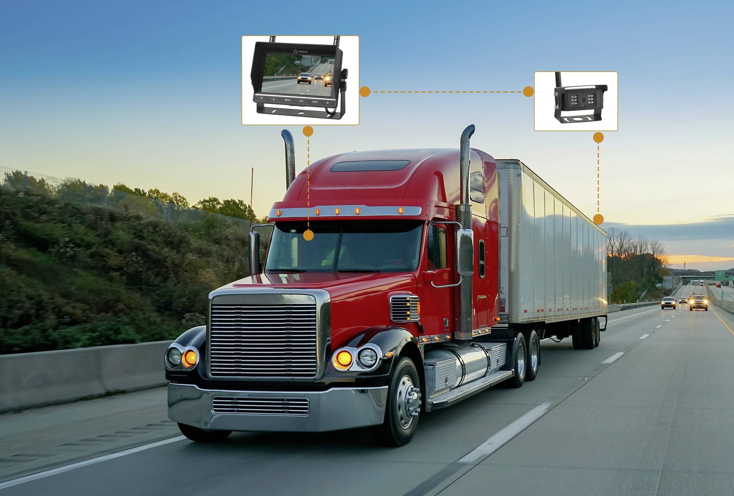 Camion rouge sur l'autoroute au coucher du soleil, équipé d'un système de caméra améliorant la sécurité.