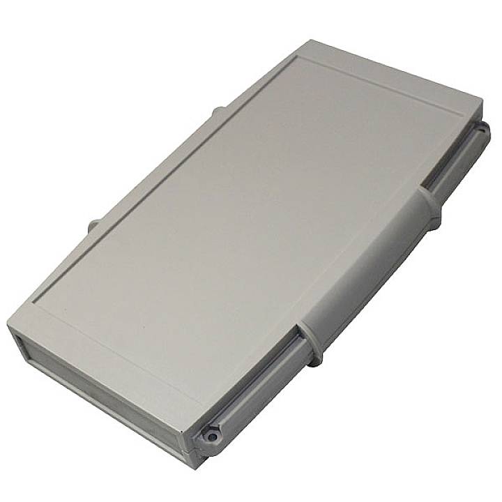 Boîtier rectangulaire en plastique gris aux bords arrondis, destiné aux appareils électroniques ou à la gestion des câbles.