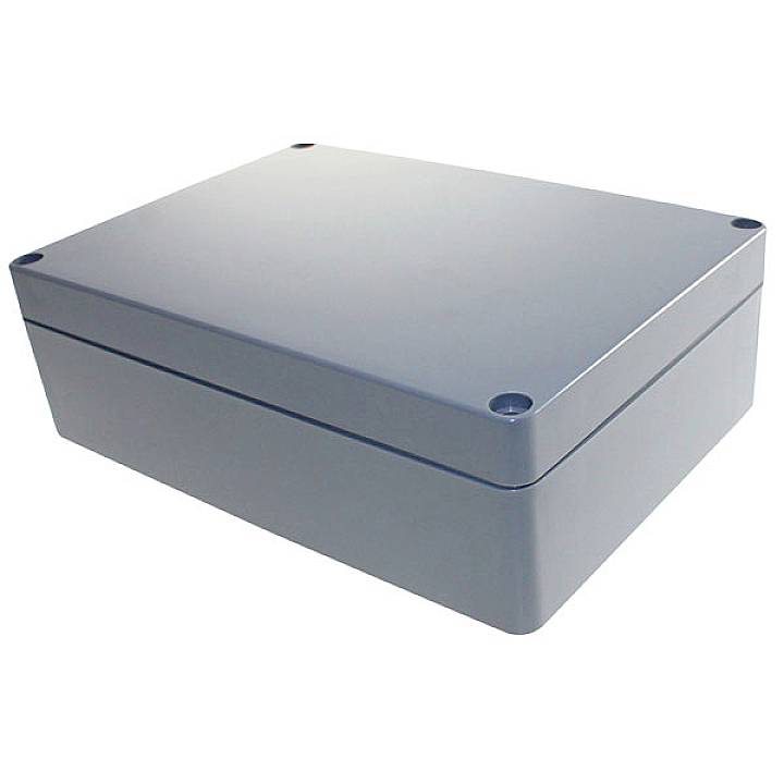 Boîtier en plastique gris, rectangulaire, à surface lisse et coins arrondis. Boîtier électronique sans contenu visible.