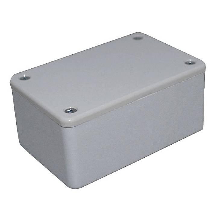 Boîtier rectangulaire gris en plastique avec des bords arrondis et quatre vis situées aux coins du dessus.