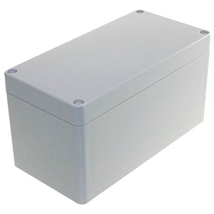 Un boîtier rectangulaire gris en plastique aux coins arrondis et quatre petits trous aux coins du couvercle.