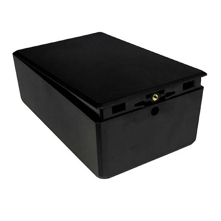 Boîtier noir rectangulaire aux bords arrondis, doté d'une petite ouverture centrale sur la face avant.