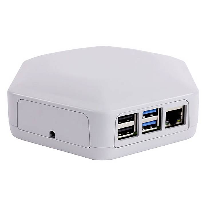 Ein rechteckiges, weißes Elektronikgerät mit mehreren USB-Anschlüssen und einem Ethernet-Anschluss auf der Vorderseite.