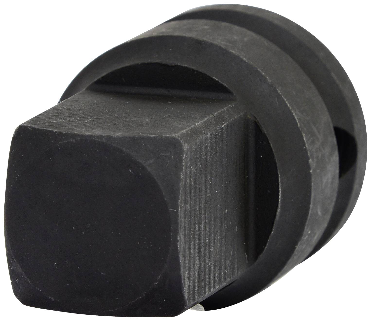 Un outil noir, solide, métallique avec une pointe carrée et des bords arrondis, probablement un élément d'un assemblage mécanique.