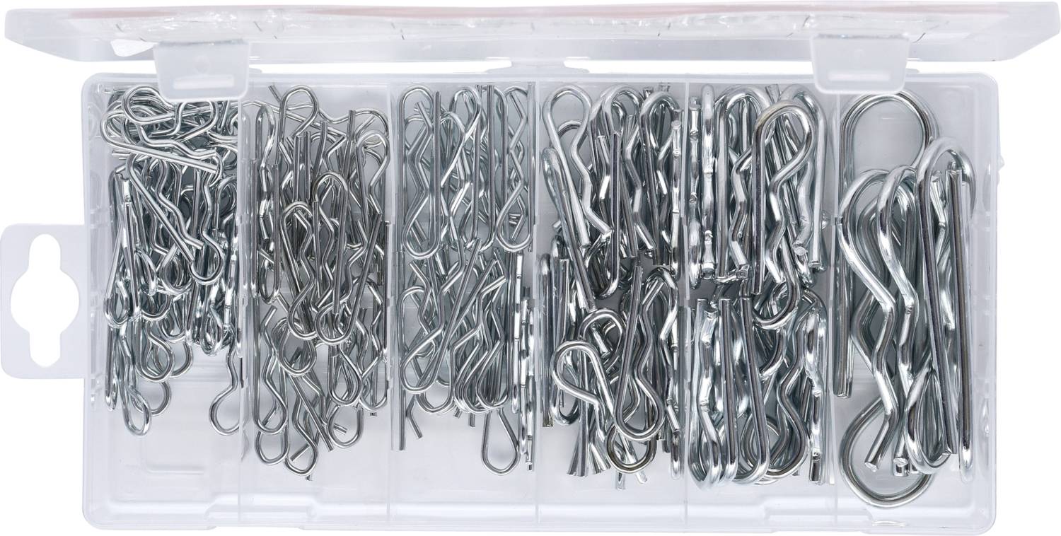 Un récipient en plastique ouvert rempli de fiches métalliques, soigneusement rangées dans cinq compartiments de différentes tailles.
