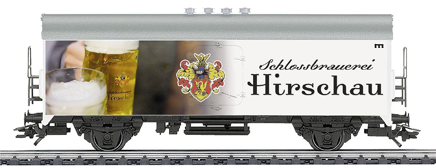 Wagon de train miniature avec la publicité de la 'Brasserie du Château de Hirschaue'. Représente deux verres de bière et un blason sur le côté du wagon.
