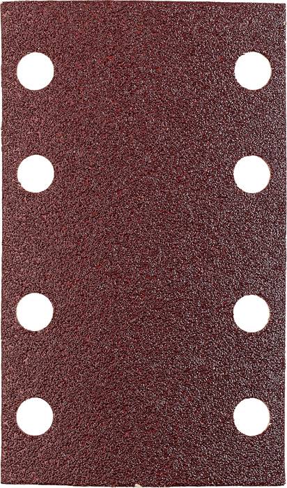 Papier de verre usé avec six trous ronds disposés en deux rangées. La surface est rugueuse et présente une couleur rouge-brun.