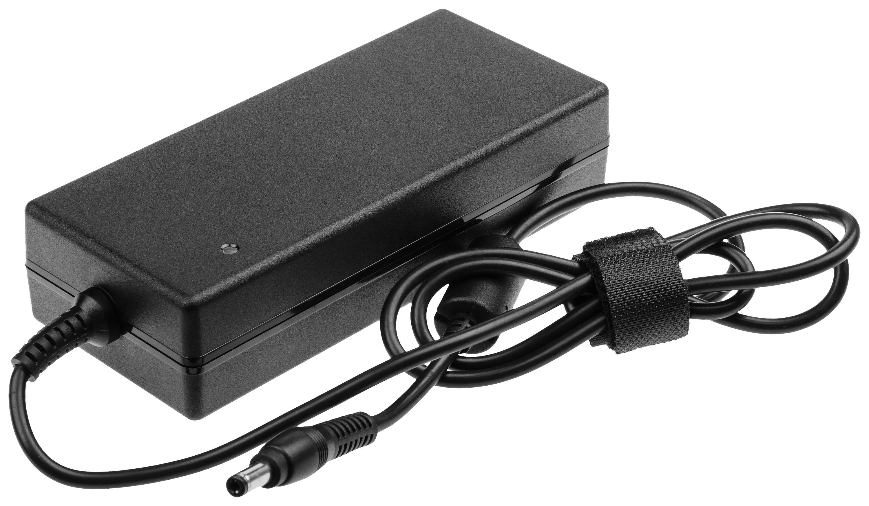 Bloc d'alimentation noir rectangulaire avec connecteur DC et câble, maintenu soigneusement à l'aide d'un serre-câble autoagrippant.