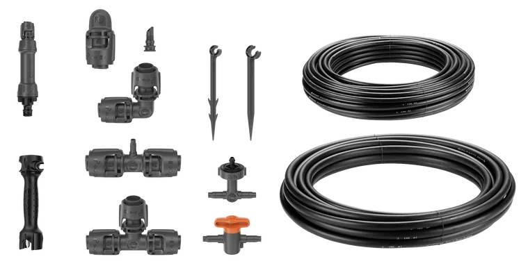 Ensemble de système d'irrigation : Divers connecteurs et tuyaux, adaptés à l'irrigation de jardin et aux systèmes d'irrigation goutte à goutte.