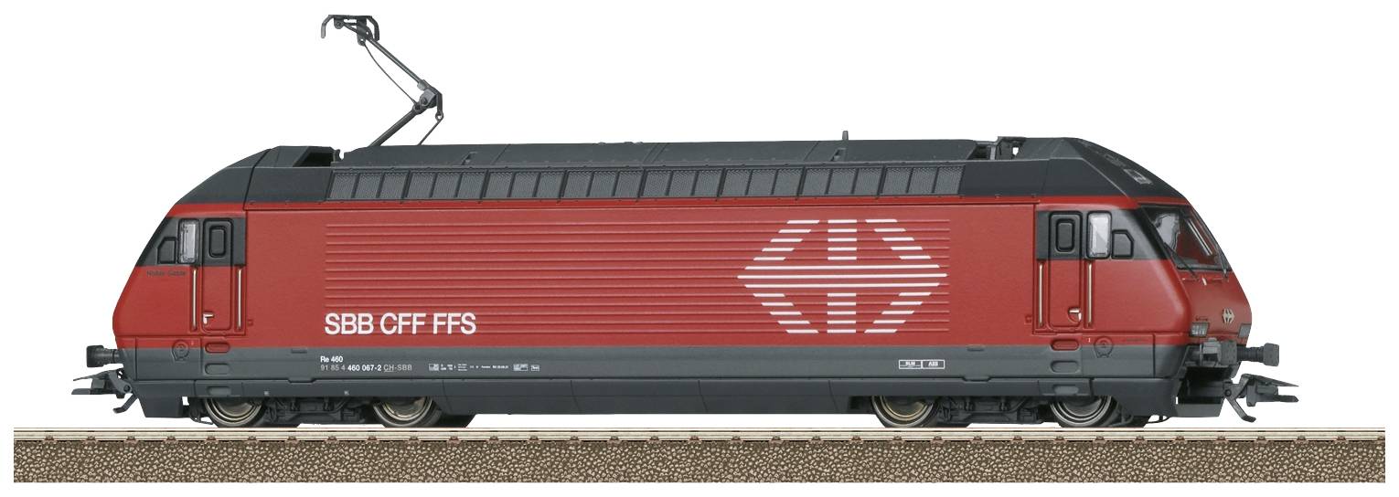 Un modèle rouge d'une locomotive suisse portant l'inscription 'SBB CFF FFS', posé sur une section de voie ferrée.