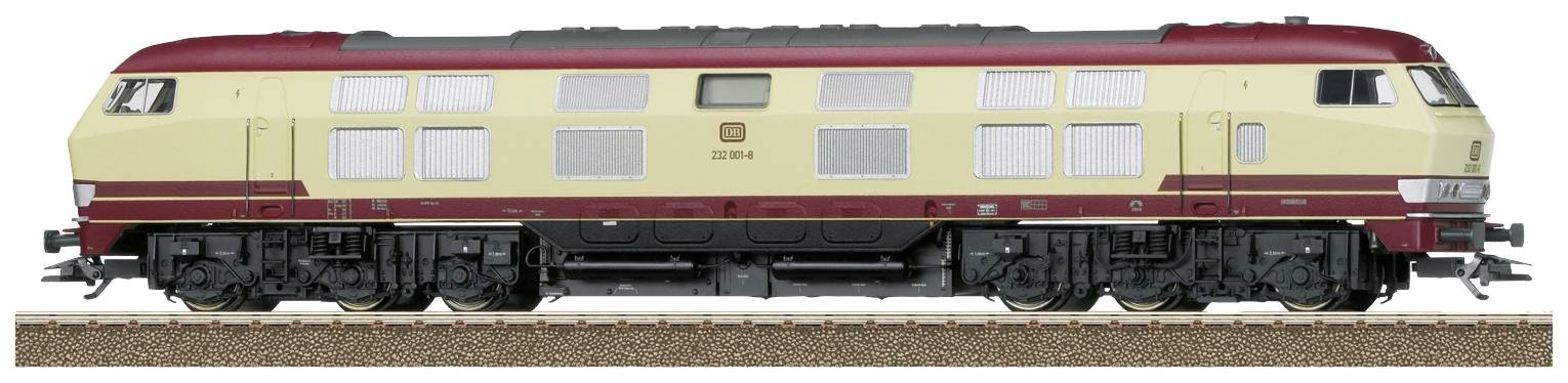 Une locomotive modèle d'un train diesel allemand en peinture rouge et beige est posée sur une voie ferrée.