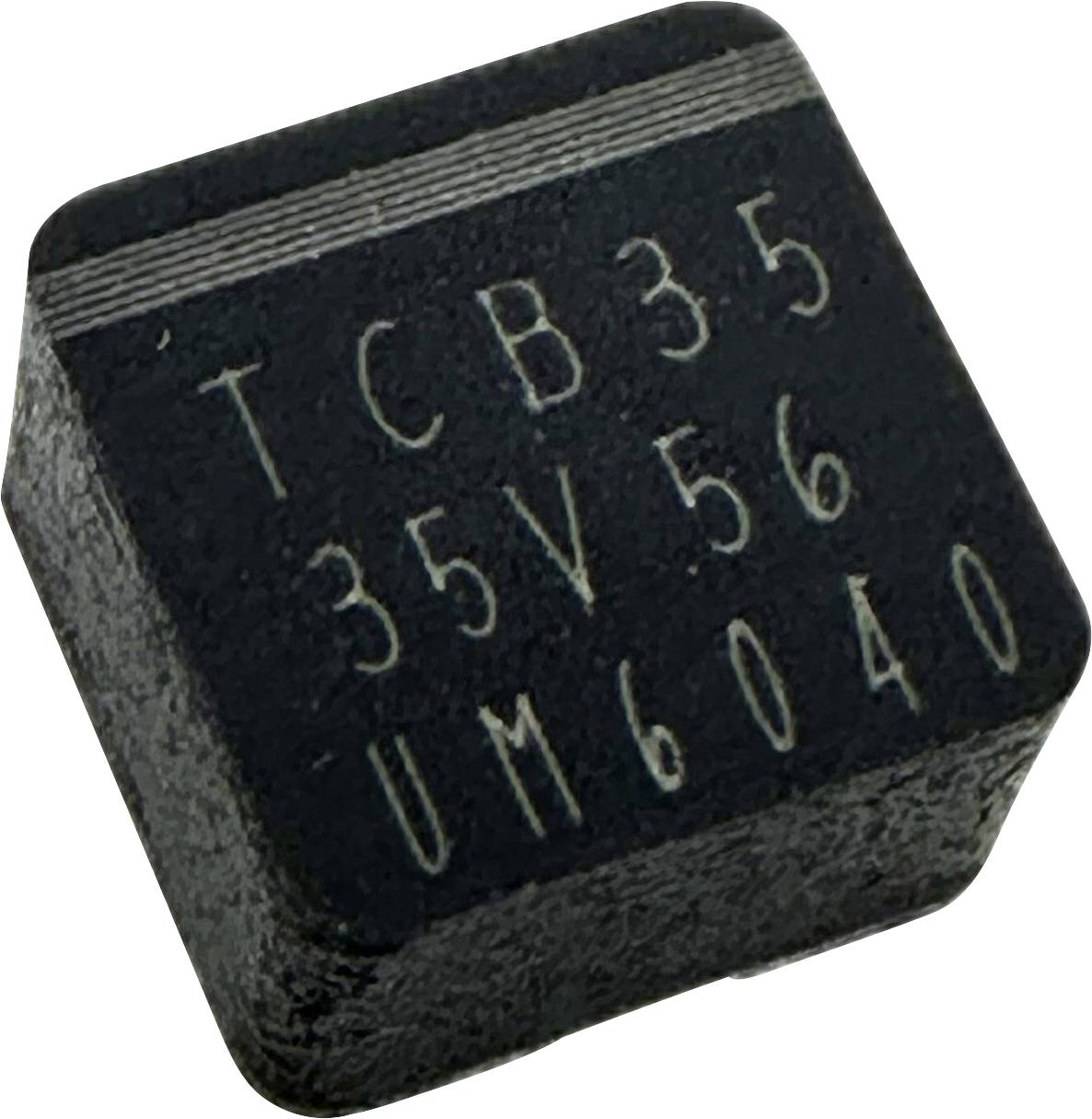 Un circuit électronique noir rectangulaire portant l'inscription 'TCB35 35V56 UM6040'.