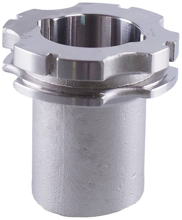 Partie de machine métallique de forme cylindrique avec un profil denté sur le bord supérieur, probablement un engrenage ou un élément de couplage.