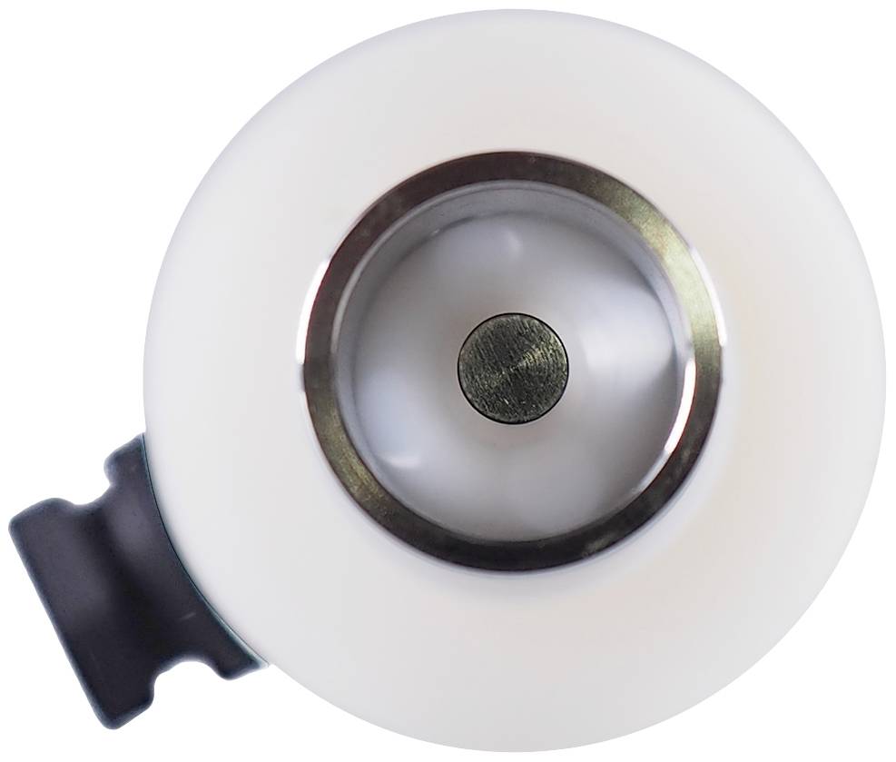 Rouleau blanc avec un centre métallique brillant, vu de dessus. Un support noir est fixé sur le côté.