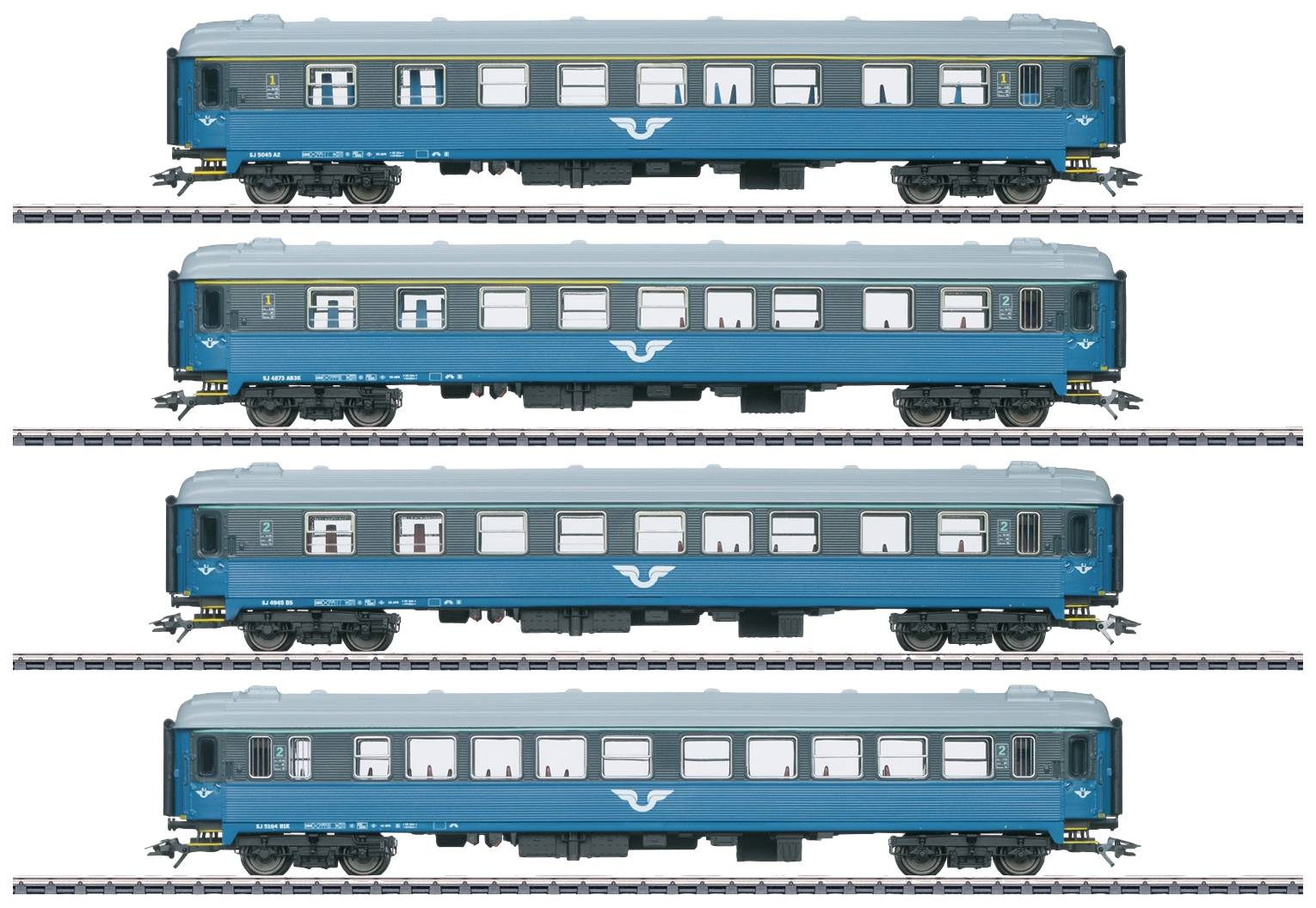 Quatre trains modèles bleus alignés sur des rails. Chaque train présente des différences au niveau des fenêtres et des portes. L'objectif : illustrer les variations de conception ferroviaire.