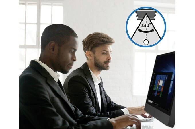 Deux hommes en costumes travaillent sur des ordinateurs dans un bureau lumineux. Un symbole en haut à droite indique un ajustement d'inclinaison de ±30°.