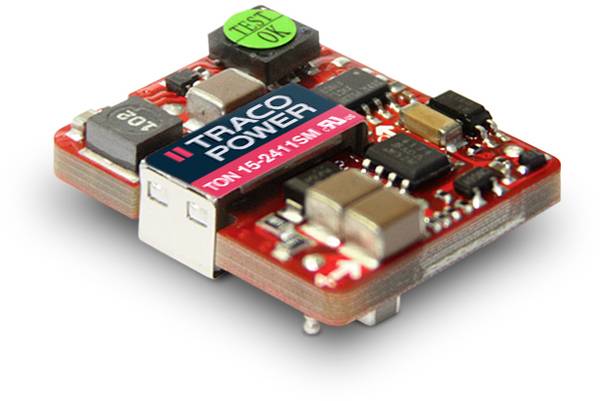 Composant électronique avec un circuit imprimé rouge, plusieurs condensateurs, une bobine et une inscription 'TRACO POWER'.