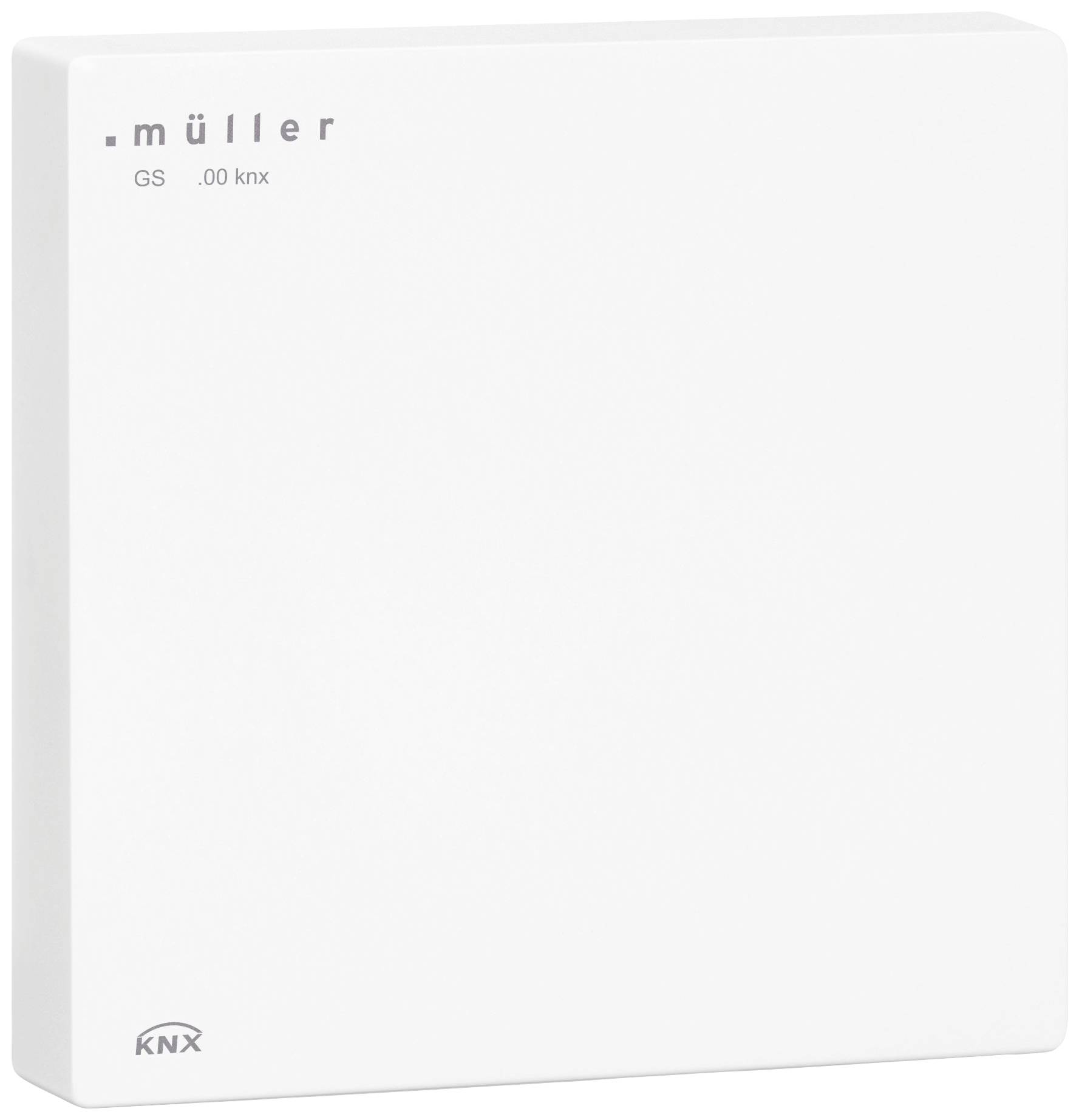 Un appareil carré blanc portant l'inscription 'müller GS .00 knx'. Situé en haut à droite de l'image. Il semble s'agir d'un dispositif électronique de commande.