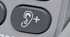 Un bouton avec un symbole d'oreille et un signe plus, probablement pour régler le volume d'un appareil.