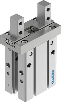 Cylindre industriel de Festo avec plusieurs trous filetés et support fixé. Utilisé pour le contrôle précis des mouvements dans les machines.