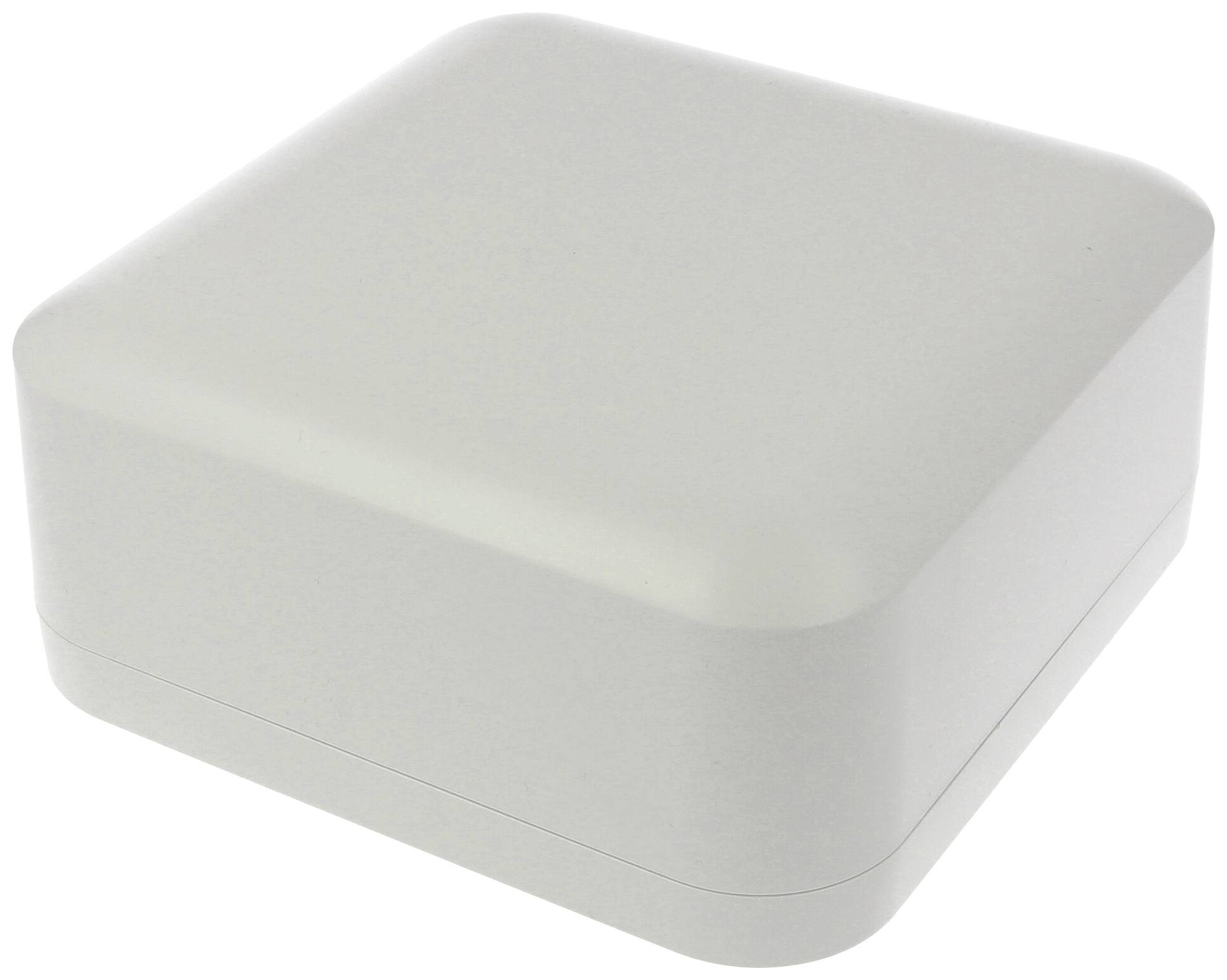 Boîte carrée blanche aux coins arrondis, fermée et au design épuré.