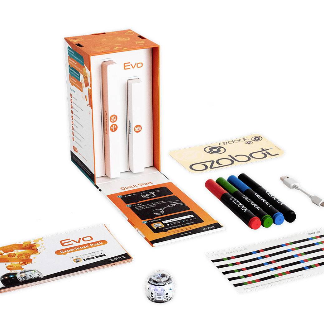 Le kit 'Evo Roboter' comprend un robot, un manuel d'instructions, des stylos ressemblant à des marqueurs de différentes couleurs, des cartes, un câble de chargement USB et un tapis de programmation codé par couleurs.
