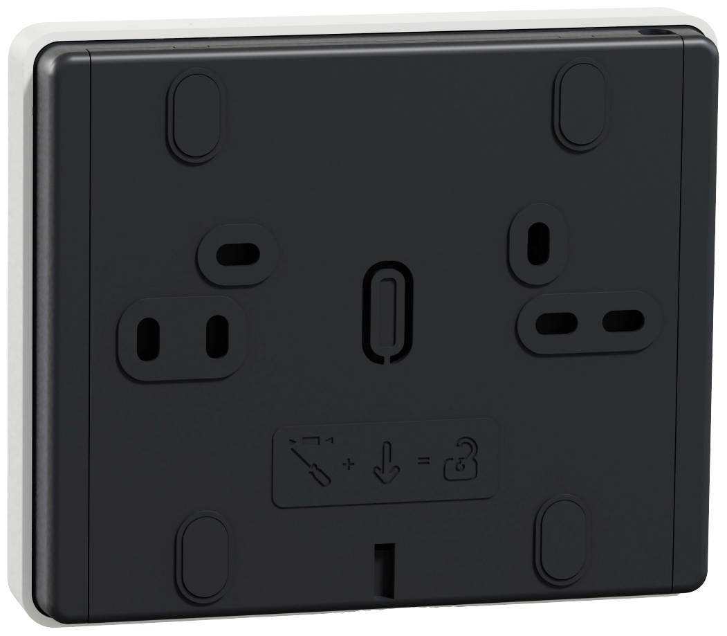 Un panneau mural rectangulaire noir avec différentes ouvertures et symboles, pouvant servir de plaque de fixation pour des appareils électroniques.