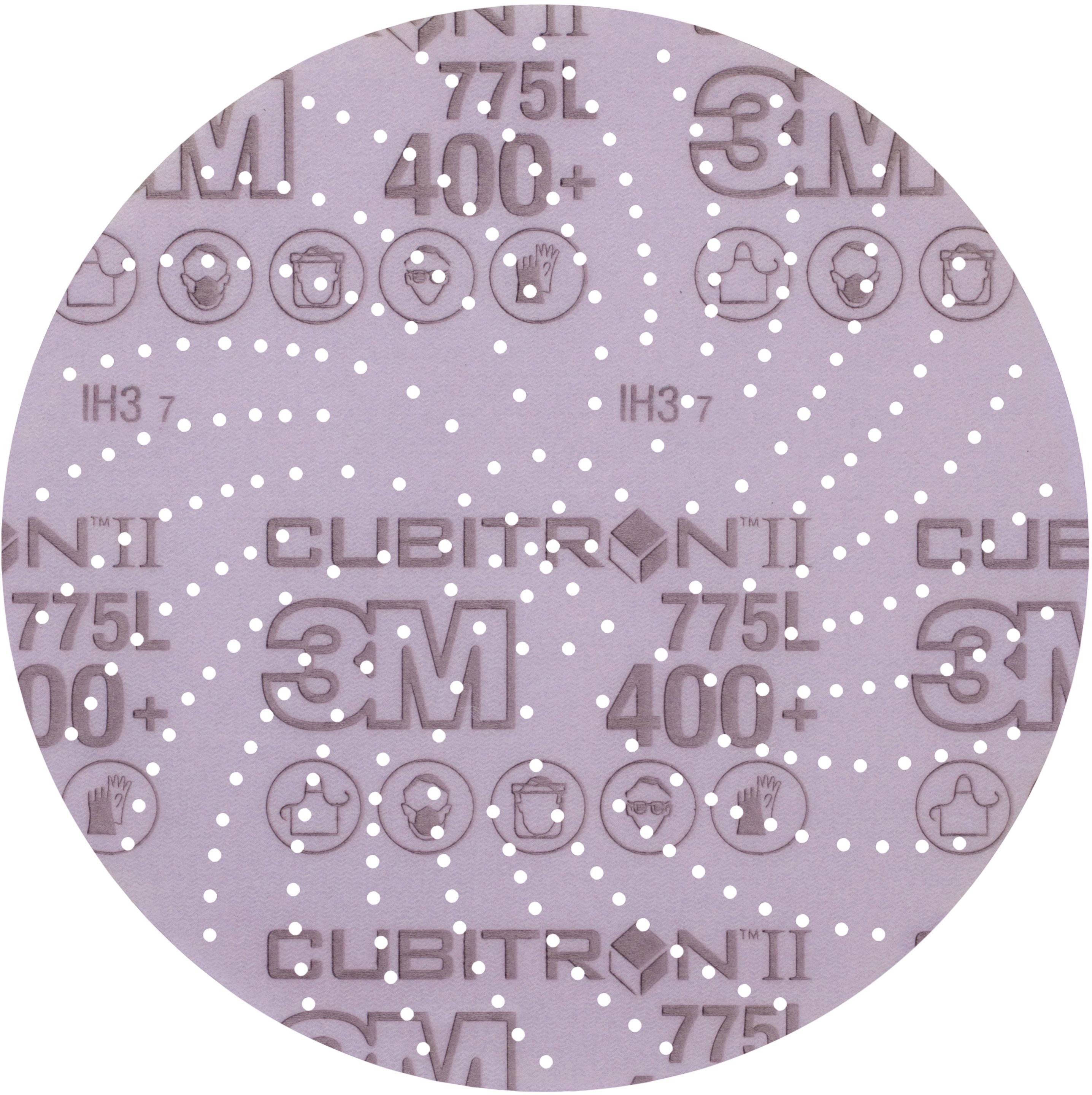 Un disque abrasif rond violet avec des points blancs et l'inscription '3M Cubitron II 775L 400+'. Des symboles d'équipement de protection sont visibles.