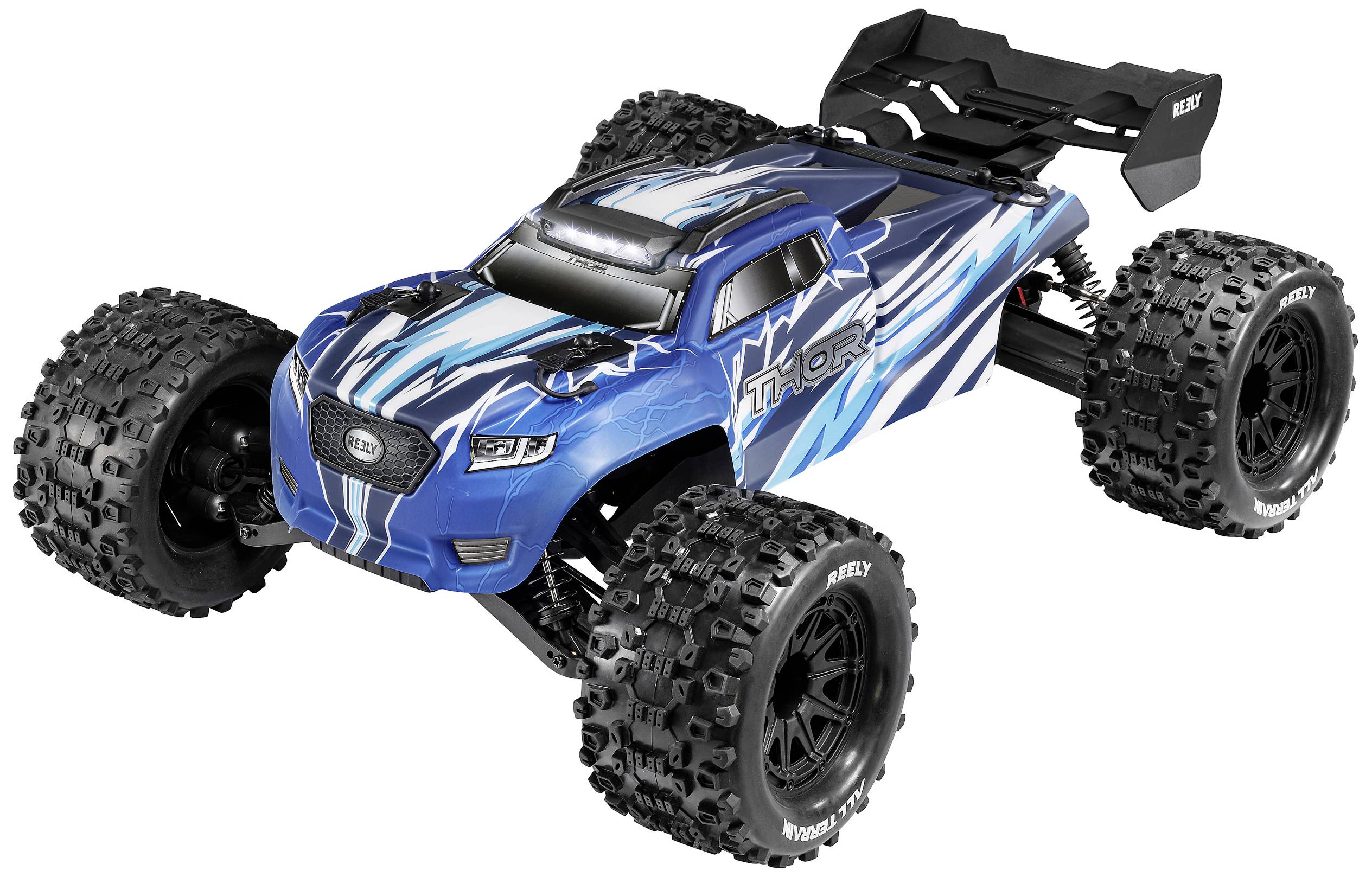 Camion télécommandé bleu avec de grands pneus à gros crampons et un design sportif. Inscription 'Thor' sur le côté.