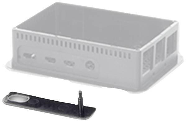 Un appareil électronique rectangulaire avec des connexions sur le côté. Devant lui se trouve un petit couvercle noir avec un stylo fixé.