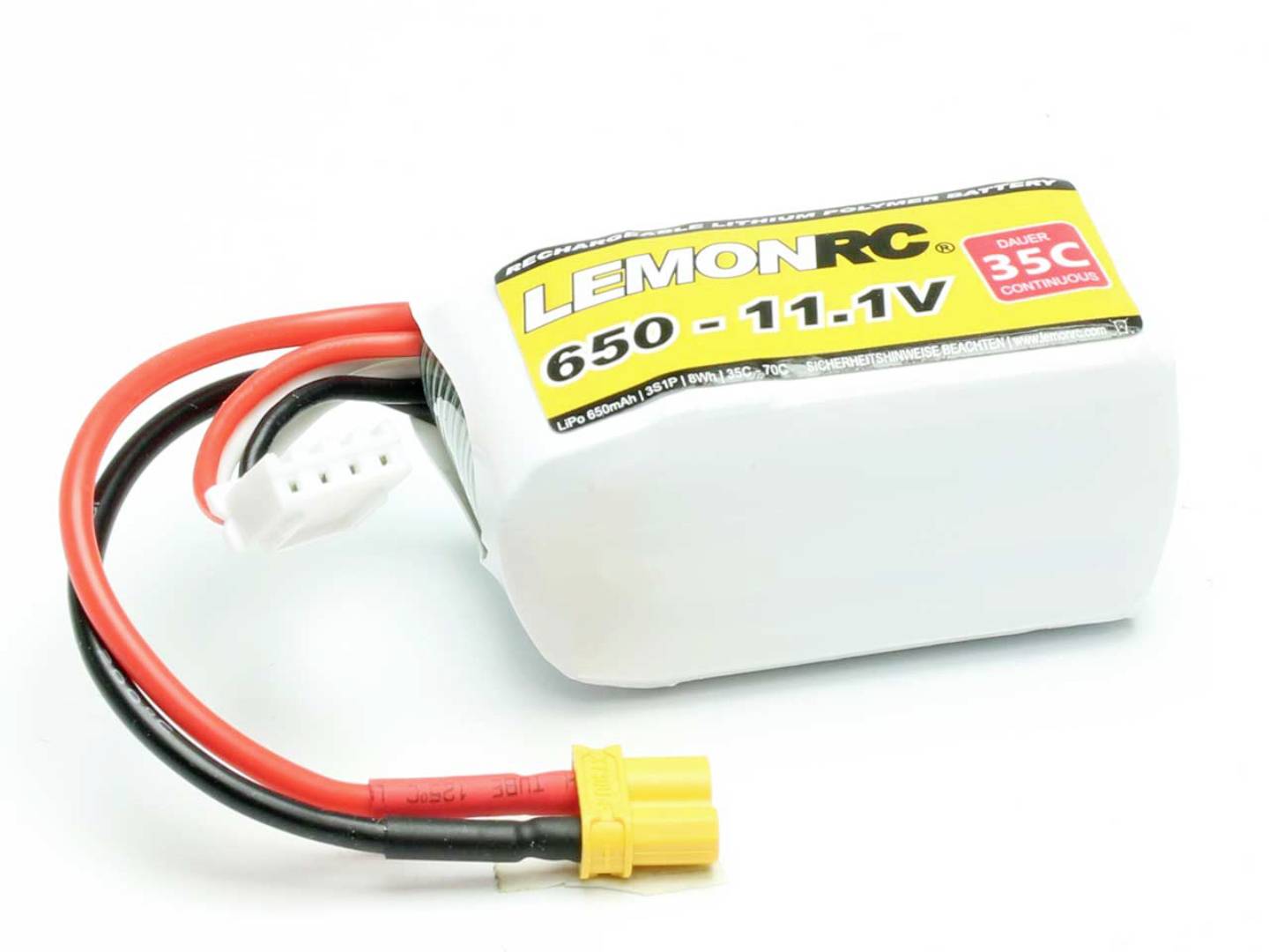 Une batterie Lithium-Polymère portant l'étiquette 'LEMONRC 650 - 11.1V', puissance nominale 35C, avec des câbles de connexion rouges et noirs.