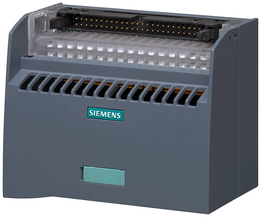 Un appareil électronique gris avec le logo Siemens sur la façade avant. La zone supérieure présente des connexions. Dispositif destiné à une utilisation industrielle.