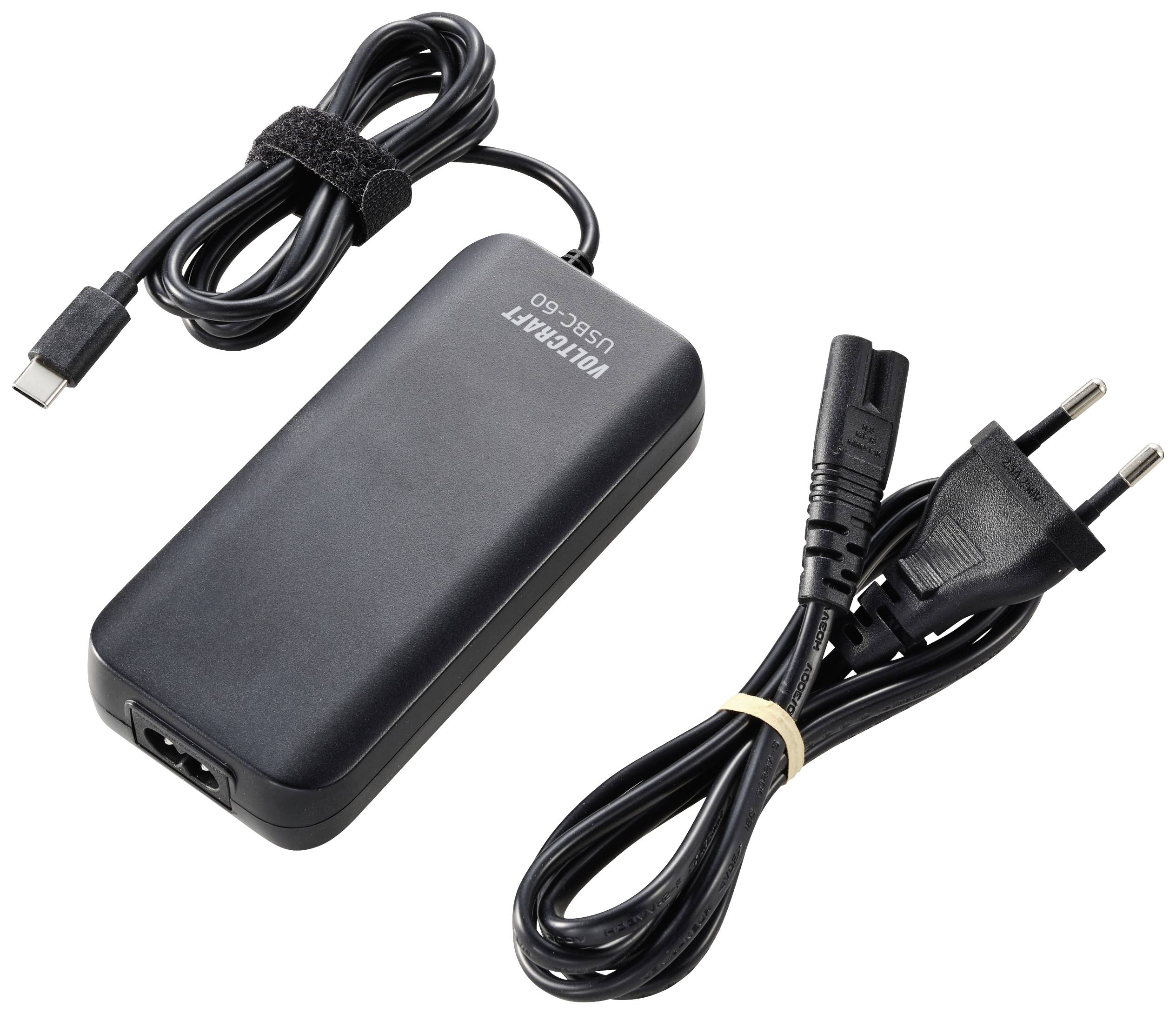 Bloc d'alimentation avec câble USB-C et fiche UE, fournis séparément. Design noir, adapté aux ordinateurs portables et autres appareils.